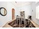 Bright dining room featuring a glass-top table and chandelier at 1458 Foxtail Dr, Lake Mary, FL 32746