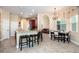 Eat-in kitchen with breakfast bar and view into Gathering room at 1458 Foxtail Dr, Lake Mary, FL 32746