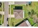 Birds-eye view of a home and neighborhood showcasing the roof, lawn, and landscape at 15199 Sugargrove Way, Orlando, FL 32828