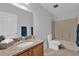 Bathroom featuring granite vanity, shower-tub combo and updated toilet and fixtures at 15199 Sugargrove Way, Orlando, FL 32828