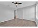 Bright bedroom with hard wood floors, closet and ceiling fan at 15199 Sugargrove Way, Orlando, FL 32828