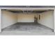 Picture of a two car garage with white cinder block walls and ceiling with visible support structure at 1719 Sw 166Th St, Ocala, FL 34473