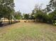 Large backyard with playset and privacy fence at 1933 Winnebago Trl, Fern Park, FL 32730