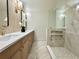 Modern bathroom with double vanity and walk-in shower at 1933 Winnebago Trl, Fern Park, FL 32730