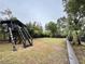 Elevated treehouse with wooden stairs at 1933 Winnebago Trl, Fern Park, FL 32730