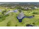 Aerial view of neighborhood with lakes and landscaping at 194 Post Way, Casselberry, FL 32707