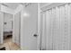 Clean bathroom with shower stall and bedroom view at 194 Post Way, Casselberry, FL 32707