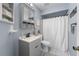 Grey bathroom with updated vanity and shower at 194 Post Way, Casselberry, FL 32707