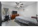 Cozy bedroom with a double bed, dresser, and desk at 194 Post Way, Casselberry, FL 32707