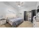 Main bedroom with king-size bed and access to patio at 194 Post Way, Casselberry, FL 32707