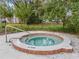 Community hot tub with surrounding landscaping at 194 Post Way, Casselberry, FL 32707