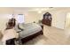 Large bedroom with wood-look floors and a walk-in closet at 209 San Carlo Rd, Davenport, FL 33896