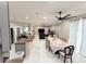 Bright dining room with table and chairs, adjacent to kitchen at 209 San Carlo Rd, Davenport, FL 33896