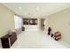 Bright dining room with chandelier and tile floors at 209 San Carlo Rd, Davenport, FL 33896