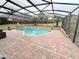 Relaxing screened-in pool area at 209 San Carlo Rd, Davenport, FL 33896