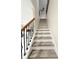 Modern staircase leading to upper level at 209 San Carlo Rd, Davenport, FL 33896