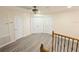 Upper hallway with light walls and wood-look floors at 209 San Carlo Rd, Davenport, FL 33896