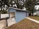 Newly renovated detached garage with red door at 2104 Newman St, Orlando, FL 32803