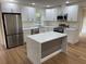 Modern kitchen with stainless steel appliances and island at 2104 Newman St, Orlando, FL 32803