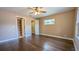 Bright bedroom with hardwood floors and spacious closet at 2405 Se 157Th Lane Rd, Summerfield, FL 34491