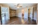 Main bedroom with wood floors and walk-in closet at 2405 Se 157Th Lane Rd, Summerfield, FL 34491