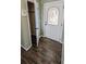 Front entry with coat closet and wood-look tile at 2405 Se 157Th Lane Rd, Summerfield, FL 34491