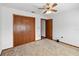 Bedroom with double doors leading to a closet and additional space at 2643 Borinquen Dr, Kissimmee, FL 34744