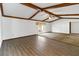 Living room with wood floors and exposed beams at 2643 Borinquen Dr, Kissimmee, FL 34744