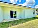 Covered back patio with access to the backyard at 2645 Sw 155Th Ln, Ocala, FL 34473