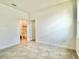 Bedroom with tile flooring and ensuite bathroom at 2645 Sw 155Th Ln, Ocala, FL 34473