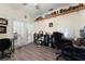 Bright and well-organized home office with hardwood floors and a large window at 3063 Juneberry Ter, Oviedo, FL 32766