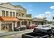 Street view of shops and businesses in a vibrant commercial area at 33431 Seattle Slew Dr, Sorrento, FL 32776