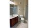 Clean bathroom with single sink vanity and shower at 3344 Robert Trent Jones Dr # 30505, Orlando, FL 32835