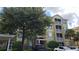 Three-story building with balconies and landscaping at 3344 Robert Trent Jones Dr # 30505, Orlando, FL 32835