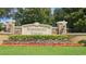 Stonebridge Reserve community entrance with landscaping at 3344 Robert Trent Jones Dr # 30505, Orlando, FL 32835