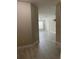 View down a hallway into the living area at 3344 Robert Trent Jones Dr # 30505, Orlando, FL 32835