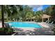 Inviting pool with lounge chairs and shaded seating at 3344 Robert Trent Jones Dr # 30505, Orlando, FL 32835