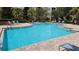 Community pool with plenty of deck space at 3344 Robert Trent Jones Dr # 30505, Orlando, FL 32835