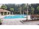 Relaxing community pool with ample lounge chairs at 3344 Robert Trent Jones Dr # 30505, Orlando, FL 32835