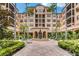 Inviting courtyard with fountain and lush landscaping at 501 Mirasol Cir # 306, Celebration, FL 34747