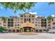 Luxury condo building with fountain and ample parking at 501 Mirasol Cir # 306, Celebration, FL 34747