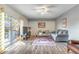 Cozy living room with a sliding glass door that opens to an outdoor patio and seating area at 5368 Elm Ct # 354, Orlando, FL 32811