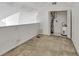 Unfinished attic space with access to utilities, offering potential for storage or customization at 6034 Westgate Dr # 202, Orlando, FL 32835