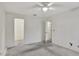 Spacious bedroom with multiple doorways and ample natural light at 6034 Westgate Dr # 202, Orlando, FL 32835