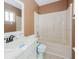 Bathroom featuring a vanity with a sink and a shower-tub combo at 611 Bay Ave, Holly Hill, FL 32117