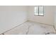 Bedroom showcasing a window and bare floors ready for customization at 611 Bay Ave, Holly Hill, FL 32117