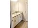 Bathroom with double vanity and granite countertop at 615 N Delmonte Ct, Kissimmee, FL 34758