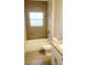 Simple bathroom with shower/tub combo and granite countertop at 615 N Delmonte Ct, Kissimmee, FL 34758