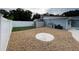 Backyard with a shed, dog house and a gravel area at 6642 Matchett Rd, Orlando, FL 32809