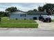 Gray house with a side yard and plenty of space at 6642 Matchett Rd, Orlando, FL 32809